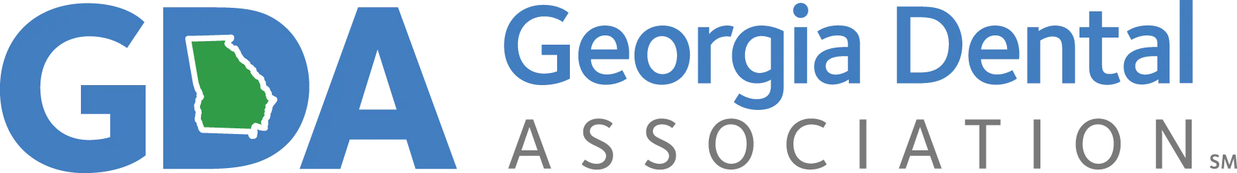 The image shows a logo with text that reads GDA Georgia Dental Association along with the acronym GDA in stylized lettering, set against a light background with a darker border.